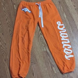 Denver Broncos sweat pants.